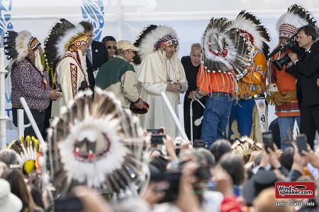 Pope Francis wears his traditional headdress